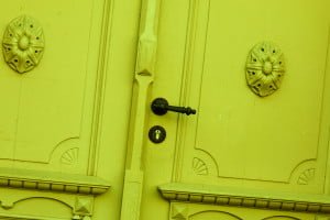 Green door and knocker 